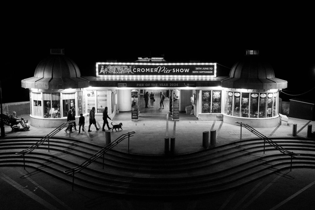 cromer pier at night in black and white