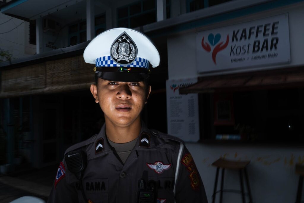 police man flash portrait labuan bajo